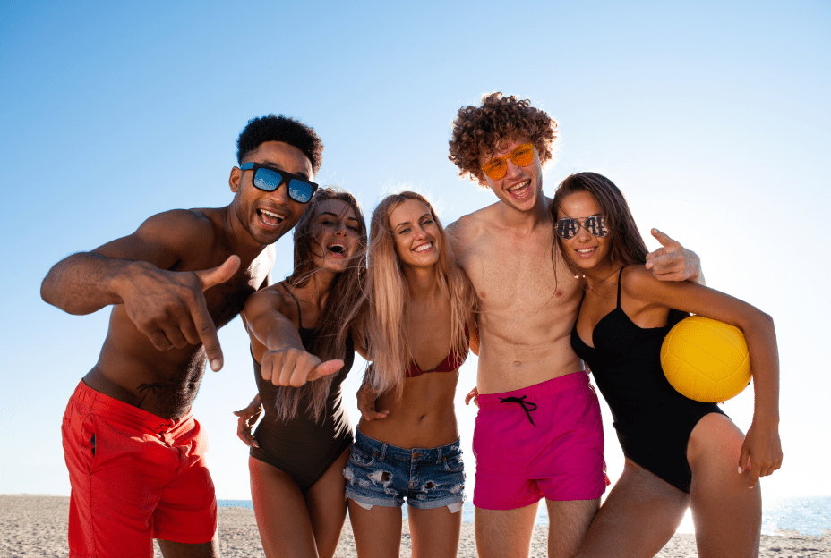 group-happy-friends-playing-beach-volley-beach 1